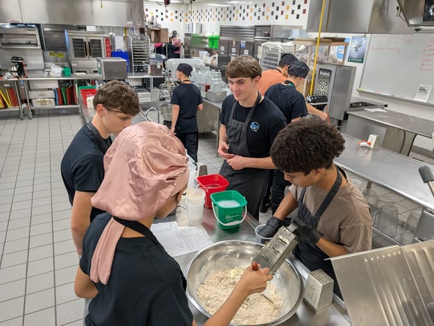 RTC students making dough for apple crisp